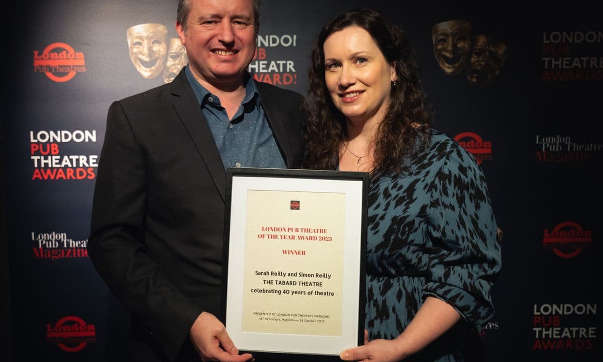 Simon and Sarah Reilly holding an award for London Pub Theatre of the Year